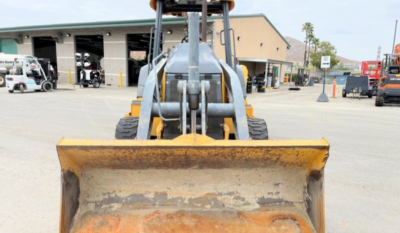 
								2015 John Deere 310EL full									